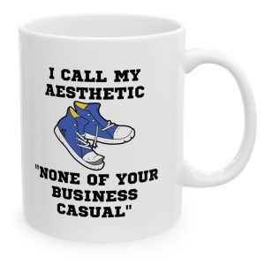 White Mug with a worn out pair of sneakers on it with the saying, "I call my aesthetic none of your business casual."