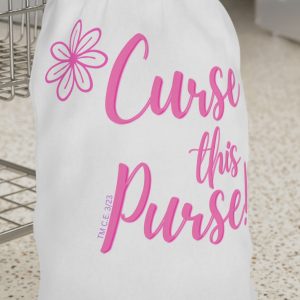 Laundry bag with cutesy lettering that says "Curse This Purse"