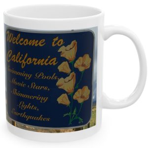 White Mug with fake state motto for California: "Swimming Pools, Movie Stars, Shimmering Lights, Earthquakes."