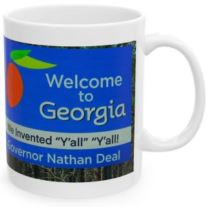 White Mug with fake state motto for Georgia: "We invented Y'all, y'all!"