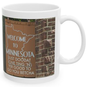 White Mug with fake state motto for Minnesota: "Just doodat one ting 'n yer good to go you betcha."