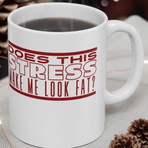 White Mug with stretched lettering with the saying, "Does this stress make me look fat?"