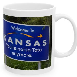 White Mug with fake state motto for Kansas: "You're not in Toto anymore."