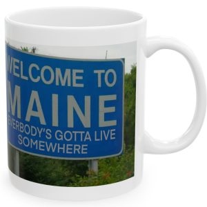 White Mug with fake state motto for Maine: "Everybody's Gotta Live Somewhere."