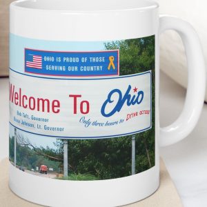 White Mug with fake state motto for Ohio: "Only three hours to drive across."
