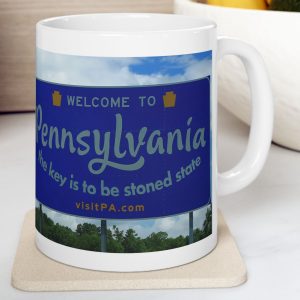 White Mug with fake state motto for Pennsylvania: "The Key is to be Stoned State."