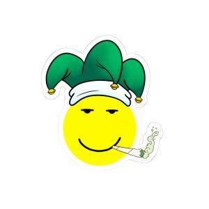 Sticker with a smiley face jester, puffy eyes, and something in his mouth.