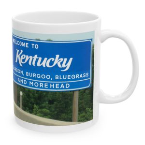 White Mug with fake state motto for Kentucky: "Bourbon, Burgoo, Bluegrass and Morehead."